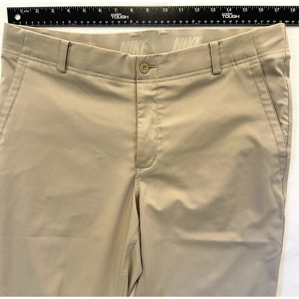 Nike Golf Dri-FIT Men's Performance Pants Khaki Tan Flat Front Size 34x27.5 Golf